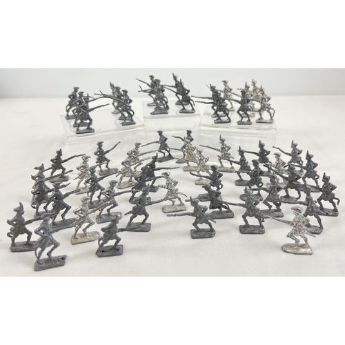 1338 - A collection of 56 lead soldier figures, each approx. 4.5cm tall.