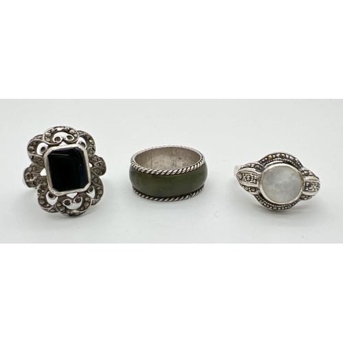 1032 - 3 silver dress rings. To include a band style set with green agate and an Art Deco style dress ring ... 