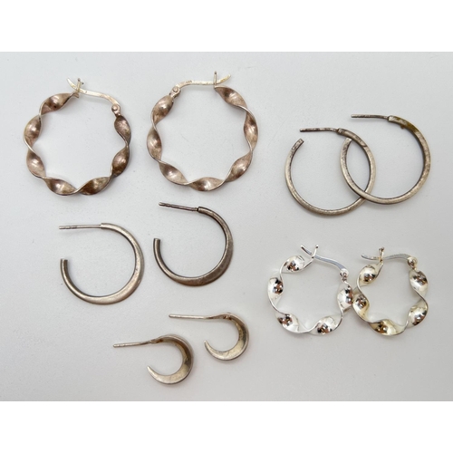 1055 - 5 pairs of hoop style silver earrings in varying sizes to include 2 of twisted design. Total silver ... 