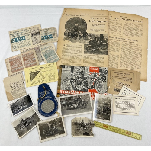 1320 - A collection of vintage automobile related ephemera to include fuel ration books and photographs. Lo... 