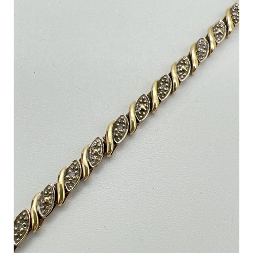 1080 - A 7.5 inch 9ct gold and diamond decorative bracelet. 30 small wave design panels, 15 set with a smal... 