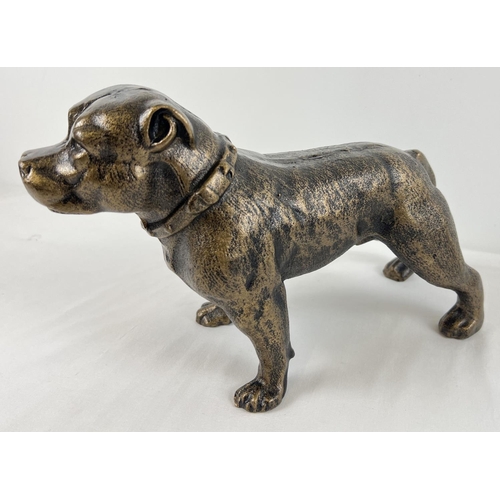 1226 - A bronzed effect painted cast iron figure of a Pitbull dog. Approx. 19.5cm x 31.5cm and weighs 5kg.