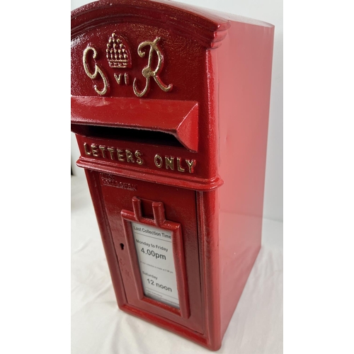 1227 - A full sized, red painted, cast metal GR post box with gold painted detail. Complete with keys. Appr... 