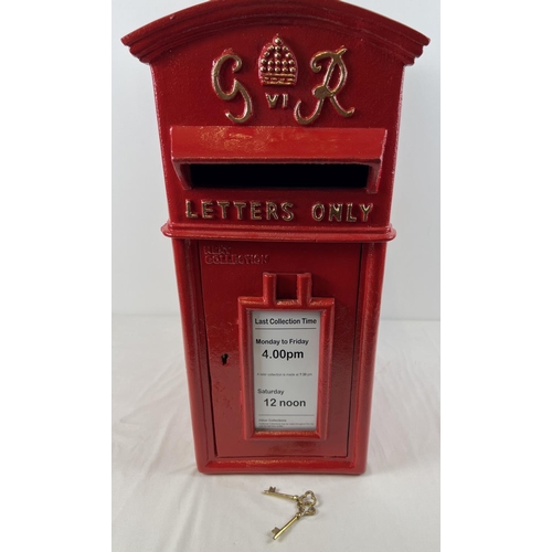 1227 - A full sized, red painted, cast metal GR post box with gold painted detail. Complete with keys. Appr... 