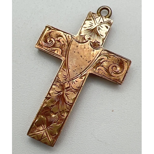 1102 - A vintage 9ct gold cross pendant with floral engraved decoration to front and empty cartouche. Full ... 