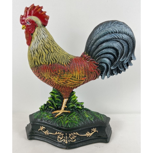 1232 - A painted cast iron door stop in the shape of a cockerel. Approx. 34cm tall.