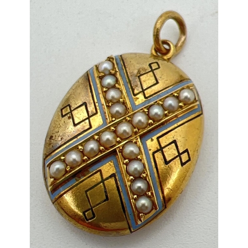 1111 - An antique gold oval locket set with seed pearls. Geometric engraved pattern to front with raised cr... 