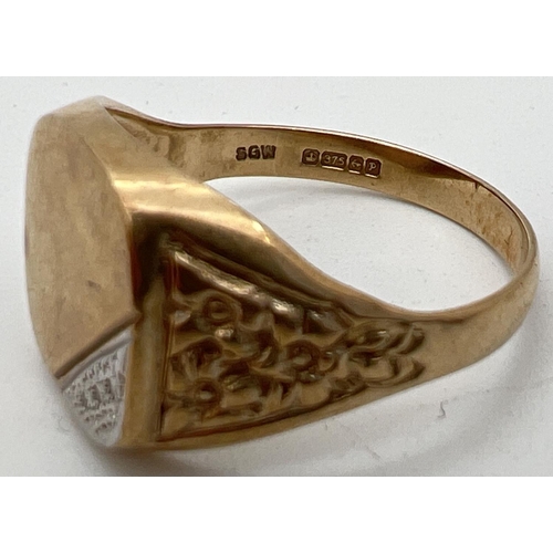 1120 - A men's 9ct gold signet ring set with 3 small round cut diamonds to one corner. Floral design to bot... 