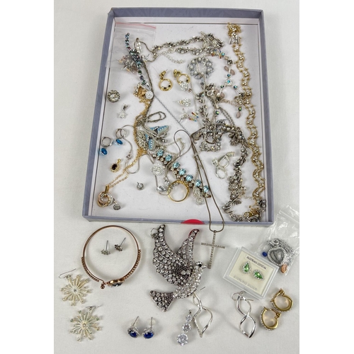 1131 - A tray of mostly modern stone set and diamante jewellery. To include large bird pendant, stud and dr... 