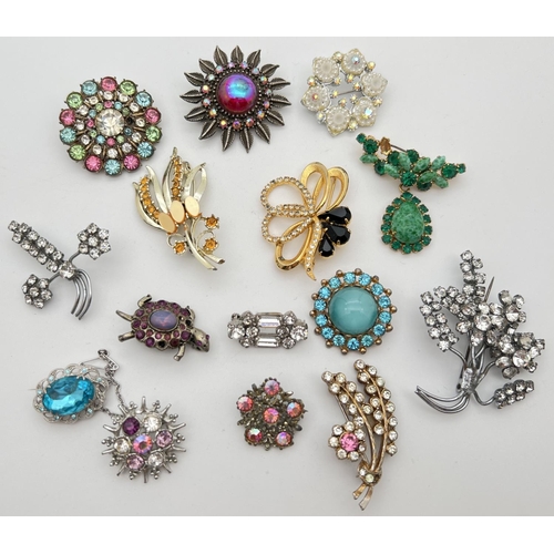 1133 - A collection of 15 vintage stone set brooches in varying colours and designs, to include floral spra... 