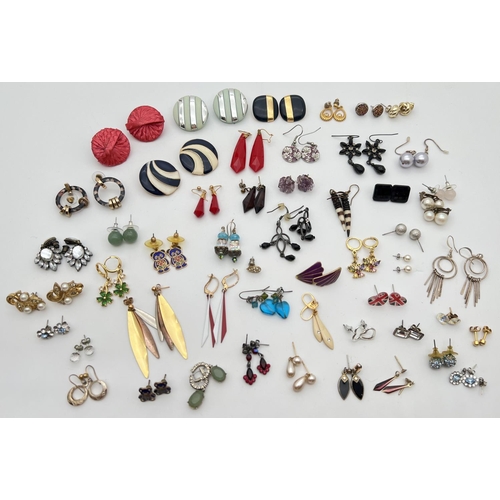 1135 - 50 pairs of vintage and modern stud and drop style costume jewellery earrings in varying designs. To... 