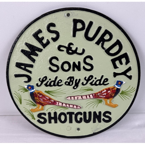 1236 - A painted cast iron wall hanging plaque for James Purdey & Sons side by side Shotguns. Approx. 22.5c... 