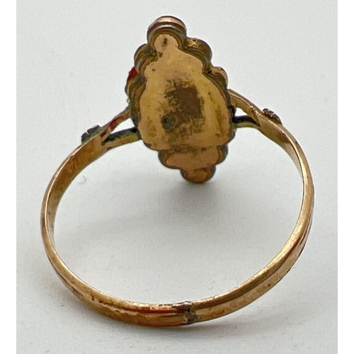 1138 - A vintage garnet dress ring with marquise shaped mount set with small round cut garnets. Ring shows ... 