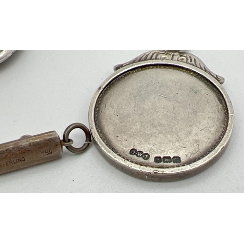 1206 - 3 silver items. A small sliding pencil with small turquoise glass cabochon, a small trophy cup witho... 