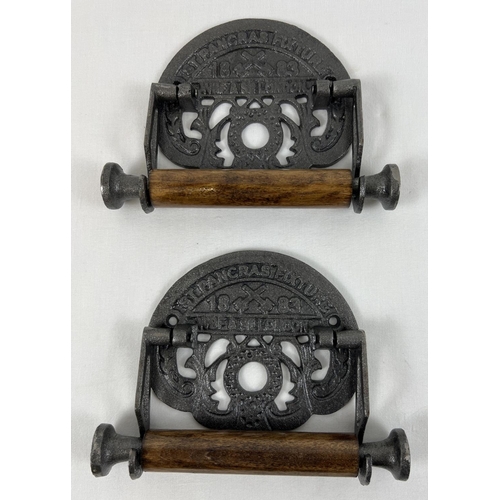 1247 - 2 cast metal wall mountable St. Pancreas WC toilet roll holders with wooden rolls. Each approx. 14cm... 