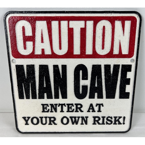 1249 - A painted cast iron Man Cave wall plaque, with fixing holes. In red, black and white. Approx. 24.5cm... 