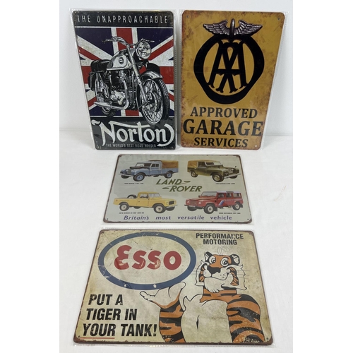 1333 - 4 automobile related tin advertising signs, as new in sealed packaging. Comprising: Esso, Land Rover... 