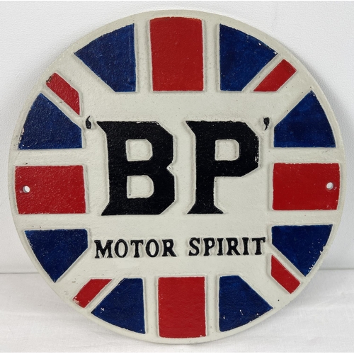 1336 - A BP Motor Spirit circular shaped painted cast iron wall plaque. In red, white blue & black. Approx.... 