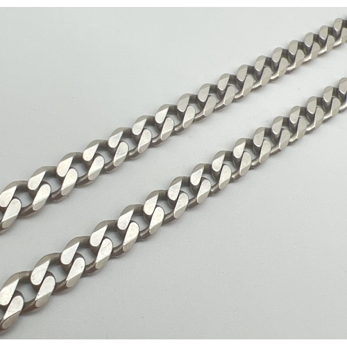 1140 - A 20 inch silver curb chain necklace with lobster claw clasp. Silver marks to both clasp and fixings... 