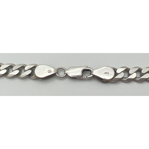 1140 - A 20 inch silver curb chain necklace with lobster claw clasp. Silver marks to both clasp and fixings... 