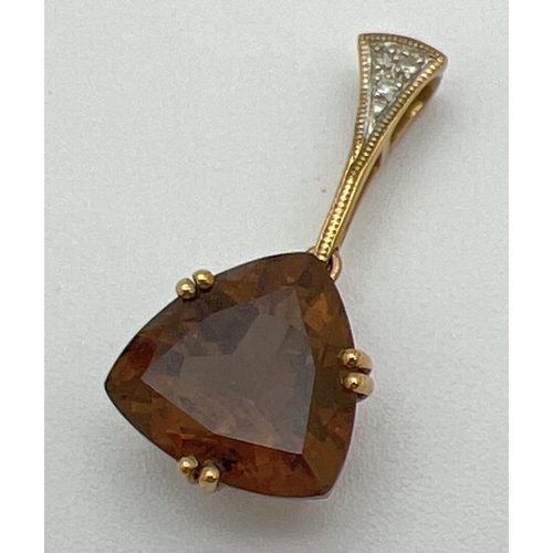 1161 - A 9ct gold drop style pendant set with a trillion cut smoked quartz and 3 small round cut diamonds t... 