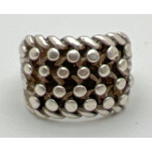 1163 - A vintage  silver keeper ring. Top of ring approx 1.5cm wide. Hallmarks to inside of band. Size R. T... 