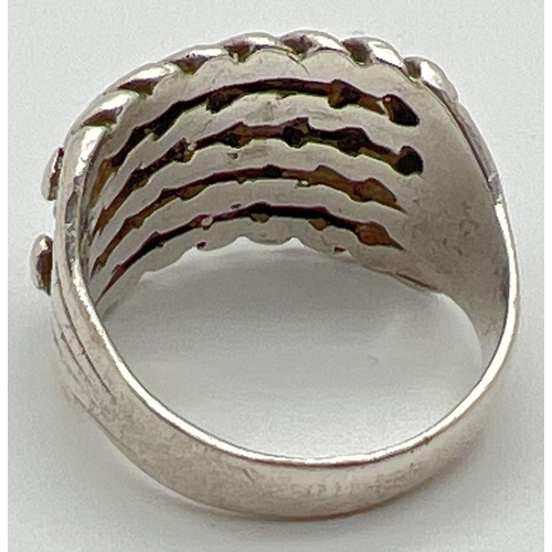 1163 - A vintage  silver keeper ring. Top of ring approx 1.5cm wide. Hallmarks to inside of band. Size R. T... 