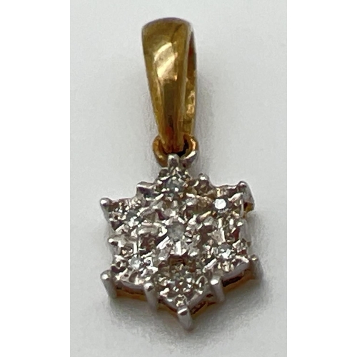 1171 - A 9ct gold drop style flower shaped pendant set with 7 small round cut diamonds. Gold marks to back ... 