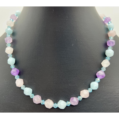 1173 - An aquamarine, amethyst and rose quartz 16