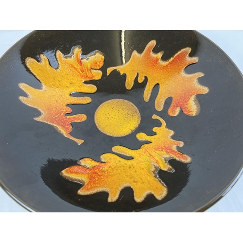 1272 - A large Poole Pottery 'Aegean' ceramic bowl in autumnal colours with oak leaf design. Approx. 34cm d... 