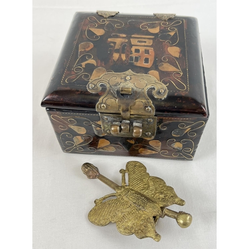 1289 - A vintage Chinese lacquer box with complete with decorative brass butterfly shaped box lock. Box wit... 