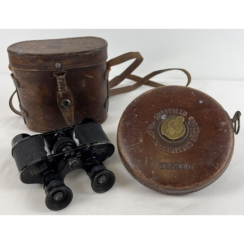 1305 - A vintage pair of Kallos Colmont, Paris binoculars together with a Chesterman tape measure. Both in ... 