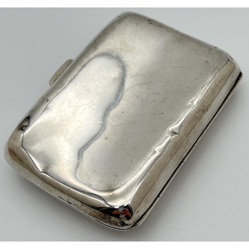 1212 - A Victorian silver curve backed cigarette case with gilt lined interior. Hinge in good order and sna... 