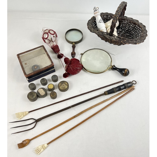 1352 - A box of mixed vintage items. To include back scratchers, small watch makers component boxes, magnif... 