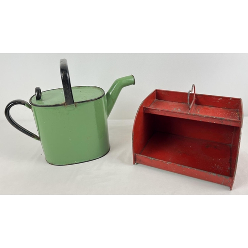 1254 - A vintage small green and black enamel watering can together with a red painted vintage metal desk t... 