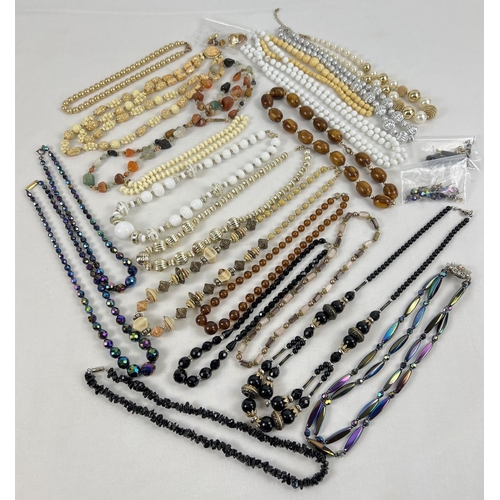 1187 - A collection of vintage costume jewellery necklaces and earrings. Mostly beaded style, to include ir... 