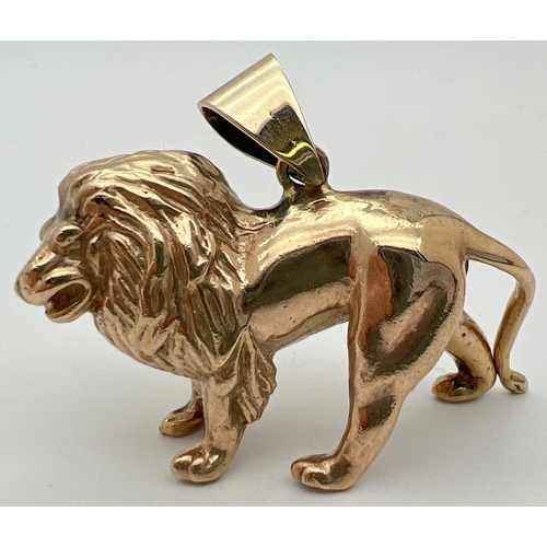 6 - A 9ct gold pendant modelled as a lion, with hanging bale. Fully hallmarked to reverse. Approx. 2.5cm... 