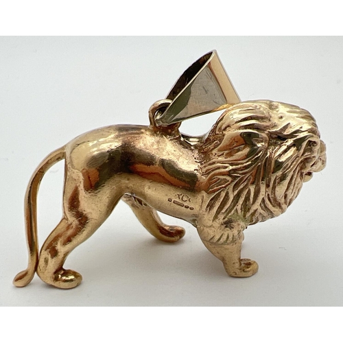 6 - A 9ct gold pendant modelled as a lion, with hanging bale. Fully hallmarked to reverse. Approx. 2.5cm... 