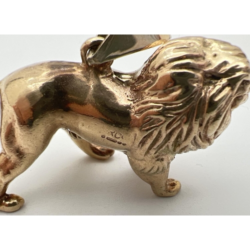 6 - A 9ct gold pendant modelled as a lion, with hanging bale. Fully hallmarked to reverse. Approx. 2.5cm... 