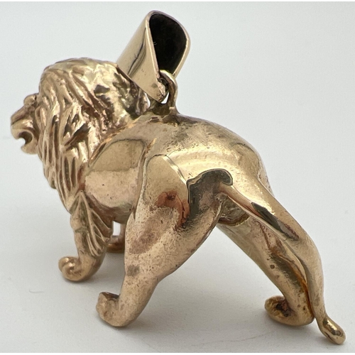 6 - A 9ct gold pendant modelled as a lion, with hanging bale. Fully hallmarked to reverse. Approx. 2.5cm... 