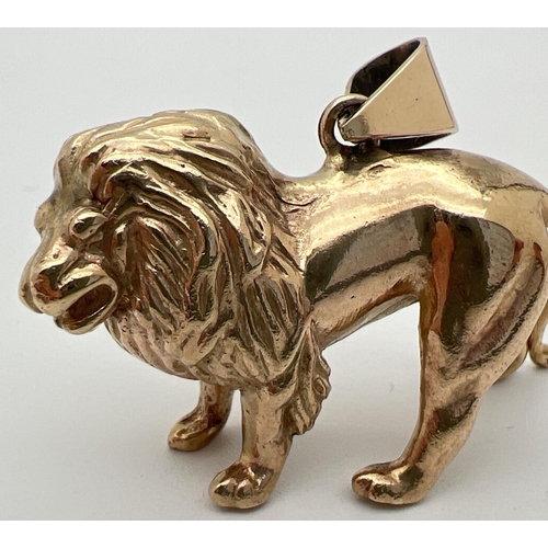 6 - A 9ct gold pendant modelled as a lion, with hanging bale. Fully hallmarked to reverse. Approx. 2.5cm... 