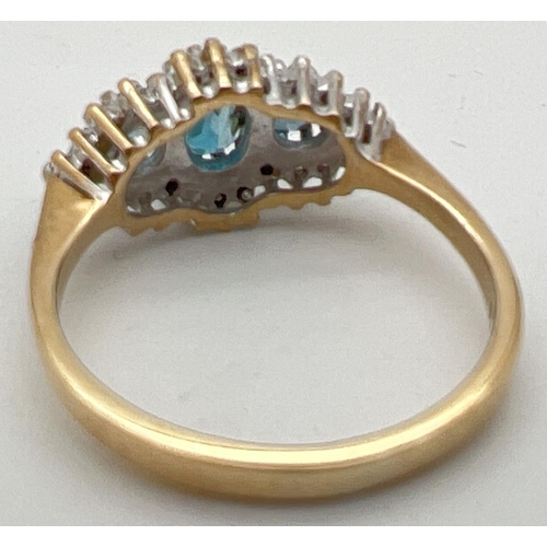 9 - A 9ct gold, London blue topaz and diamond ring in a diamond shaped halo setting. Central oval cut Lo... 