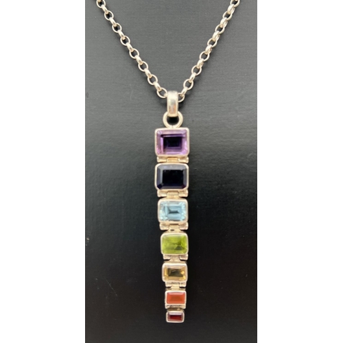 16 - A 925 silver and coloured semi precious stone pendant on a 16