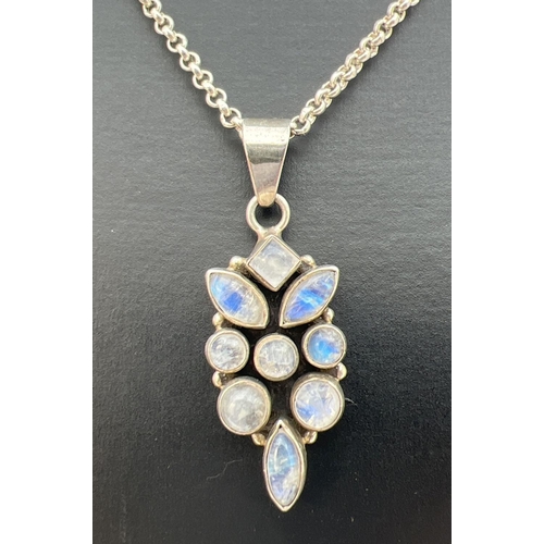 28 - A silver and moonstone pendant on a 16