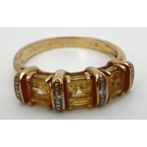 29 - A 9ct yellow gold, citrine and diamond eternity style ring. 3 square cut citrine's separated by 4 sm... 