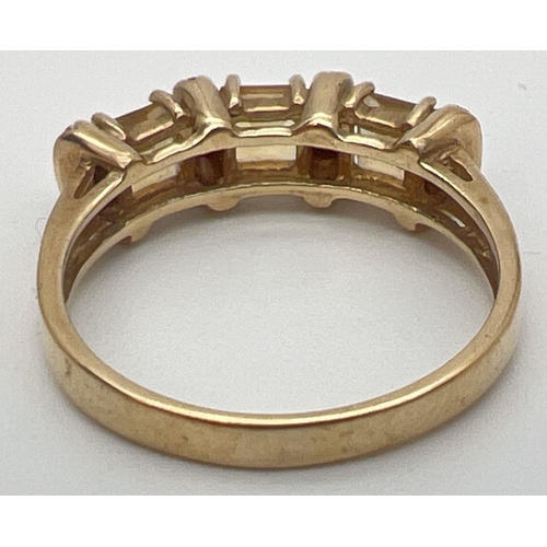 29 - A 9ct yellow gold, citrine and diamond eternity style ring. 3 square cut citrine's separated by 4 sm... 