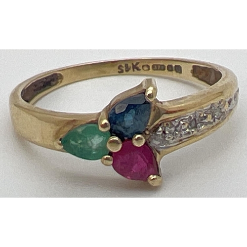 40 - A 9ct yellow gold multi stone trinity ring with a pear cut emerald, sapphire & ruby in a 3 point sta... 