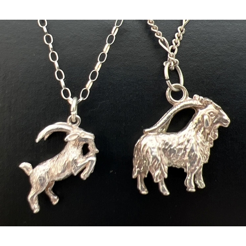 44 - 2 white metal pendants/charms in the shape of rams on 925 silver chains. A small rearing ram on an 1... 