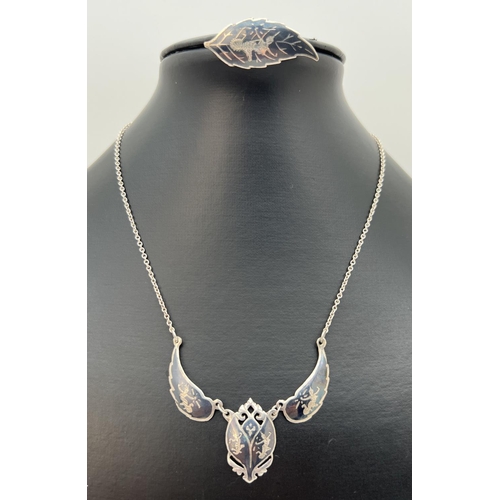 53 - 2 pieces of Siam 925 silver. A fixed pendant necklace with 3 sectional pendant together with a brooc... 