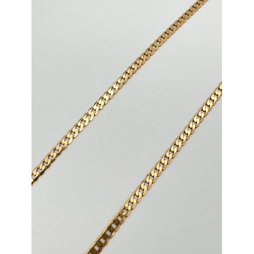 60 - A 9ct gold 18